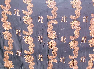 Mystic creature pakome (sarong) of dragon with Chinese character emphsis ' Dragon'