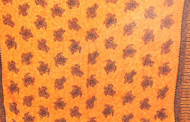 Wholesale mono beach sarong in animal theme supply mono orange wrapping sarong with multi black turtle pattern and filigree flower decor on each side