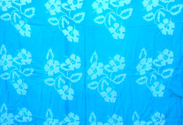 Fashion Bali beach sarong supplier distribute mono light blue sarong wrap motif multi big blooming flower pattern decor in white on each side 