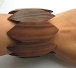 Dark coconut wooden bangle with olive shape design
