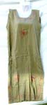Medium weight rayon pull over lady hawaiian dress with embroidered flower on top and bottom and also below the knee length design