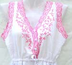 Sleeveless rayon V neck dress with adjustable string on belly and embroidery flower design