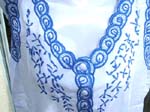 Sleeveless rayon V neck dress with adjustable string on belly and embroidery flower design