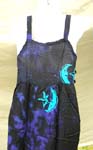 Assorted aquatic life's and hibiscus rayon dress with 3 wooden button on each side and fringe at the bottom