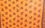 Fashion mono orange wrapping sarong with multi black turtle pattern and filigree flower decor on each side