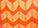 Orange sarong wrap motif multi wave line pattern design