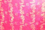Rainbow-yellow, green, purple, blue sarong wrap motif diagonal line and spiral pattern design