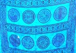 Rainbow-yellow, green, purple, blue sarong wrap motif diagonal line and spiral pattern design