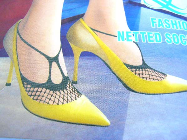 Designer shoe accessory supplier distributes fashions for retail sale. Fishnet footings in double T shape on top for comfortable and sexy look      