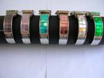 Rectangular mini flower inlaid around with assorted color face and multi sparkle chips on bangle