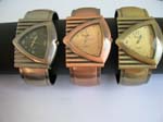 Flip over triangle cuff watch with assorted color design