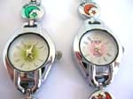 Round clock face with multi painted moon and star pattern on bangle