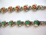 Round clock face with multi painted moon and star pattern on bangle