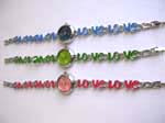 Long oval shape with assorted color design and LOVE words on bnalge