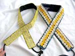 Assorted design seashell button and coconut wooden button belt with two strings for closure