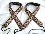 Seashell forming in flower pattern in red color belt with two strings for closure