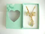 Rectangular connected shape necklace jewelry set with triple sand face line pendant design in two tone color, matched with a pair of earring and a green gift box included
