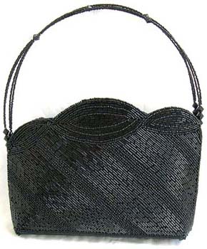 Wholesale disributors of women's handbagsblack beaded handbag motif diagonal line design with multi wavy shape on top in black long beads and thread work