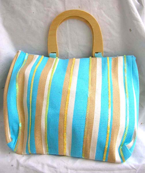 US handbag export wholesale supplier wholesale fabric blue wooden handle hand bag with blue, white and nature color line section and yellow sparkle chips thread work design