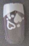 Artificial finger nails art kit with white heart design, included 10 nature nails, one glue and application on back