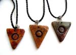 Twisted black cord necklace with triangle shape pendant carved-in circle in the middle