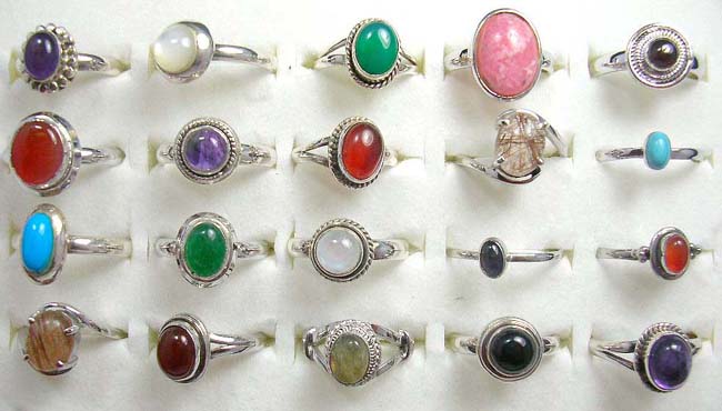 Beauty gem inlaid in solid 925. sterling silver ring. Comes in an assortment of patterns