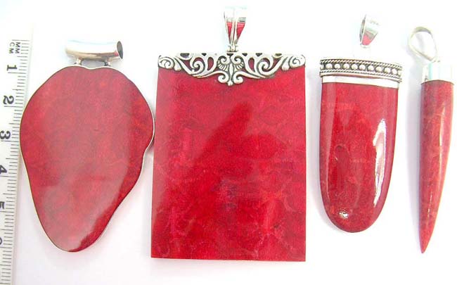Trendy coral colored stones set in 925. sterling silver mounting of beautiful pendant