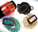 Multi beaded Bali fashion bracelet with seashell or coconut wood pendant design