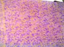 Purple batik sarong with orange mini floral design