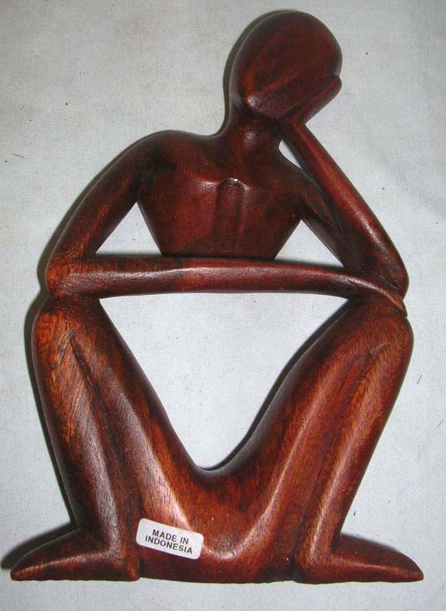 Import and export from Bali wholesaler supply tropical wooden yogi man in yoga sitting position and holding its head 