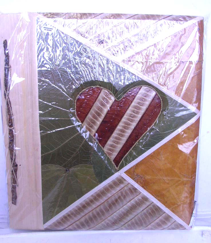 Special event gift store wholesale handmade photo album recycle paper front and back covers made from banana and other leaves
decorated with tree sticks  