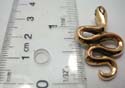 Curvy shape snake embedded bronze pendant