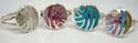 Circular assorted seashell piece and turquoise piece embedded sterlings 