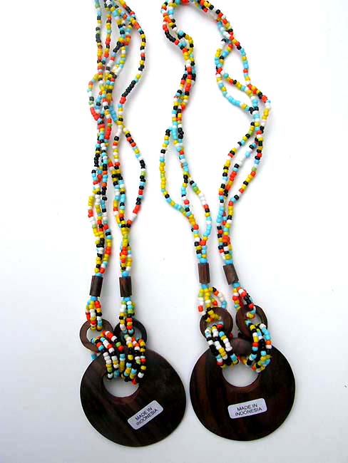 Indonesia jewelry express, Fun colored necklace holding wooden oval pendant