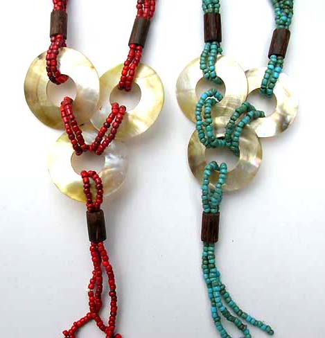 Sea shell ornament on multi string beaded necklace, international bali boutique