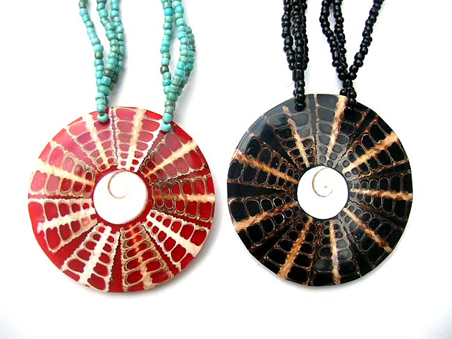 Colored sea shell pendant suspended from multi string bead necklace, fashion factory store