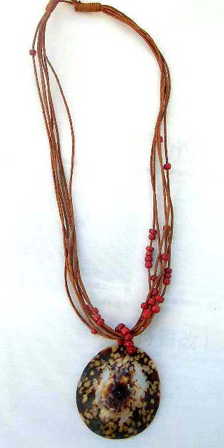 Oval sea shell pendant suspended by red beaded cord necklace, Balinese outsourcing wholesaler
        