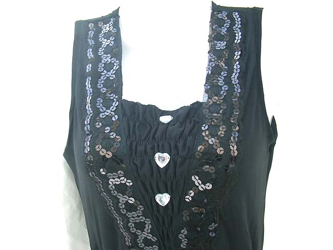 Sequin decorated, black spring dress with heart shaped adornment on front, Leisure wear exchange supplier