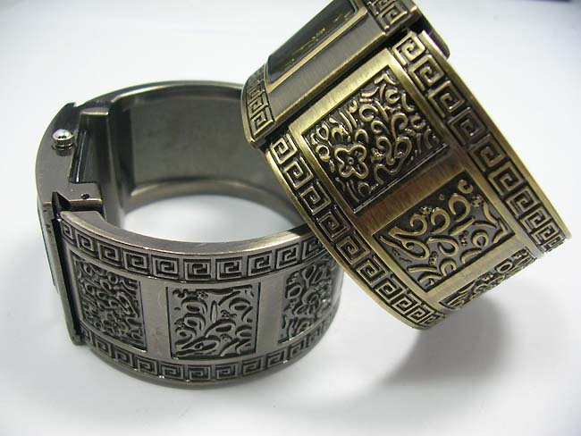 Jewelry exchange store, Vintage decorated sides on thick bangle fashion watch