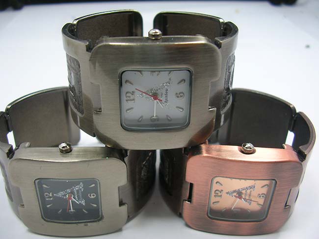 Wholesale thick bangle bracelet watch with squared clock 
face distributor