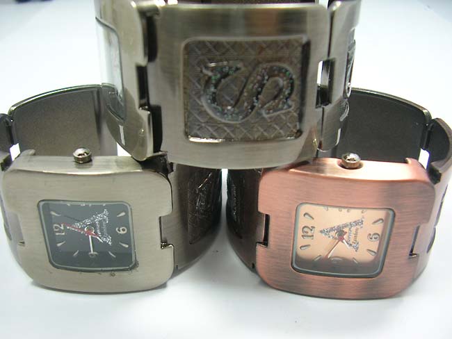 Wholesale thick bangle bracelet watch with squared clock 
face distributor