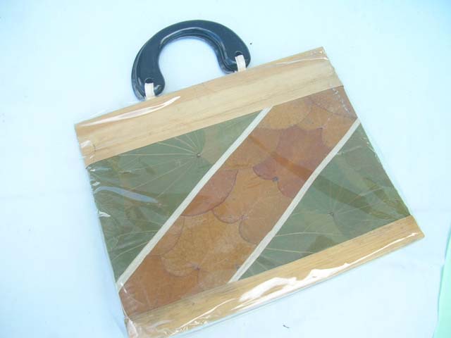 Brown, green and tan colored casual wear hand bag - international accessory supply company