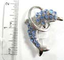 Fashion pin with dolphin jumping a hoop design with multi mini cz synthetic stone embedded