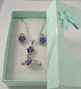 Triple dark blue and mini clear cz stone embedded leaf pattern design pendant necklace, stud earring and ring fashion jewelry box set. Spring ring clasp