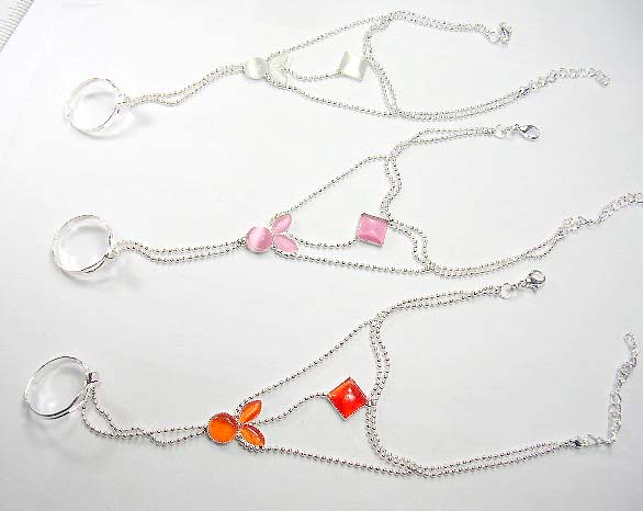 wholesale slave bracelet and wholesale cat's eye jewelry shop online supply assorted cat's eye slave bracelet motif cherr shape attached to a cz ring 