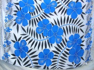 blue hibiscus flower Indonesian sarong on white background