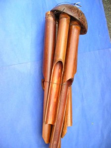 medium size plain bamboo wind chime made in Bali Indonesia 17 to 18 inches long from top coconut to end of the longest bamboo pipe