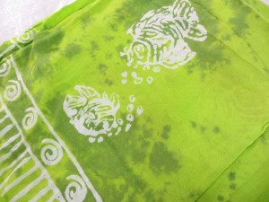 monocolor green sarong screen printings with leaves, sun, dolphin, seashell, palm leaves etc tropical designs