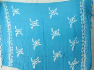 turquoise blue monocolor sarong with gecko, flower, turtel, fish, sun, dolphin, seashell, palm trees etc tropical designs