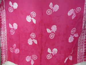 fuchsia monocolor sarong with gecko, flower, turtel, fish, sun, dolphin, seashell, palm trees etc tropical designs